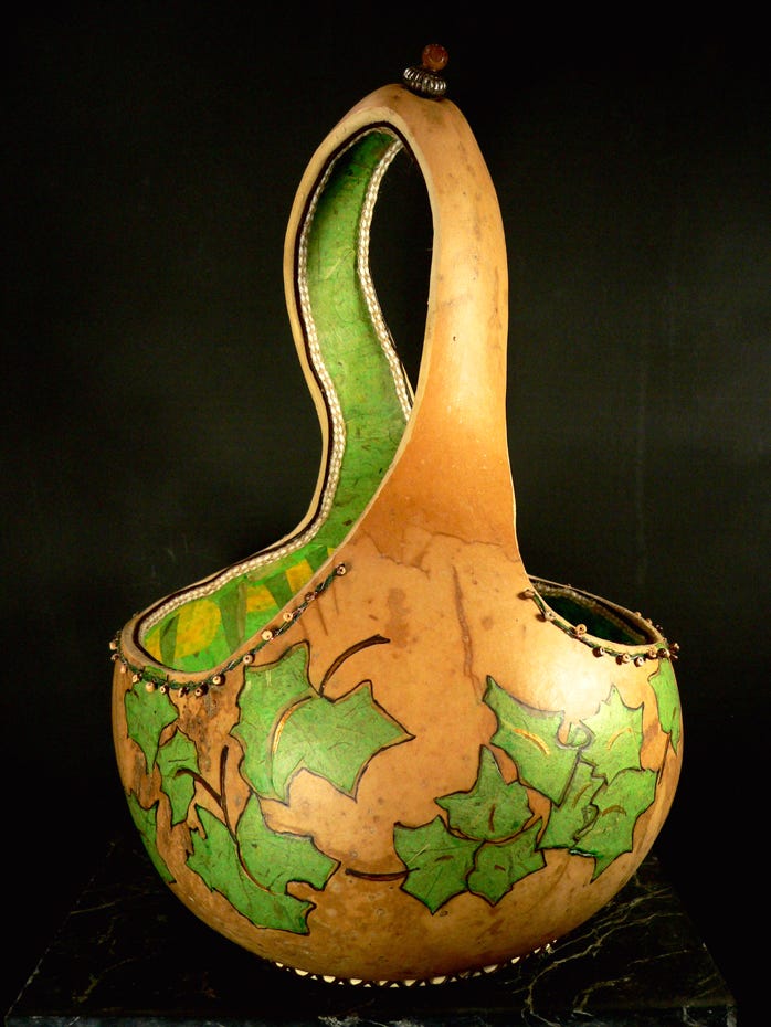 kim-grall_ivy-basket_2019_martin-gourd-with-clay-beads-paper-and-cordage_16x10x10in