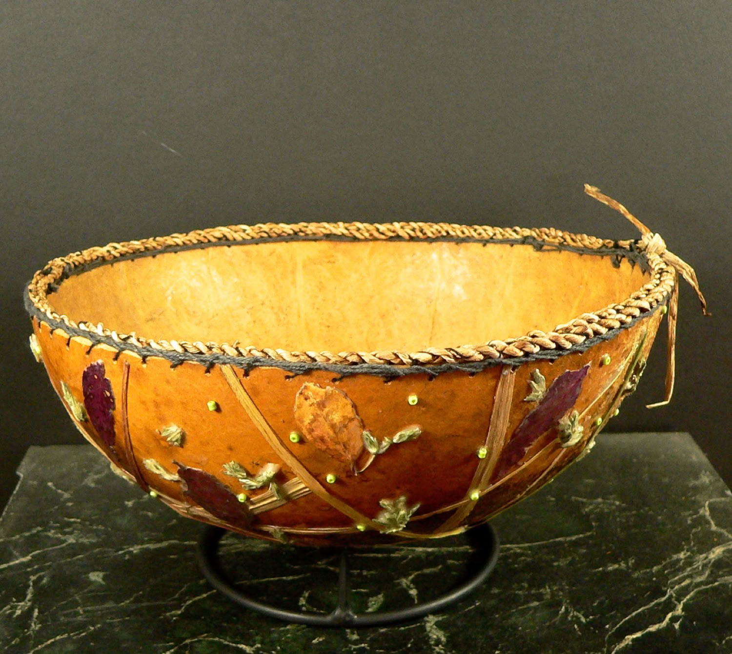 kim-grall_eyes-forward-mask_2020_top-of-flat-bushel-gourd-multimedia-including-stained-glass-old-slate-nails-and-beads_11x11x13in